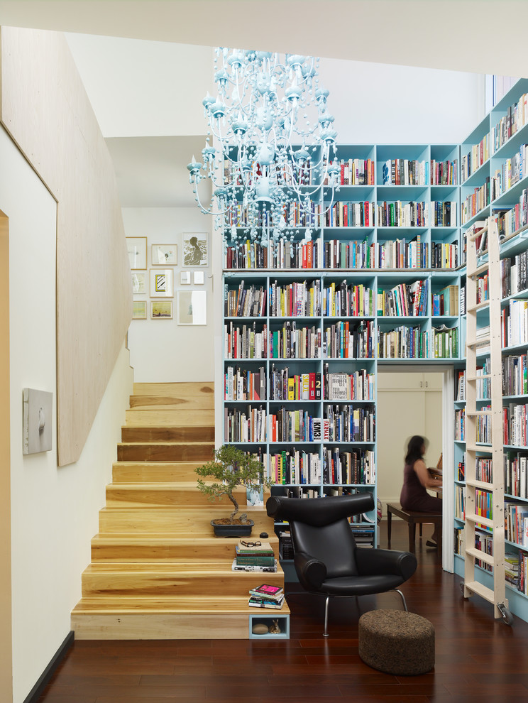 tall-bookshelves-staircase-contemporary-with-black-leather-chair-blue-book-shelves-blue-chandelier-brown-ottoman-built-in-library